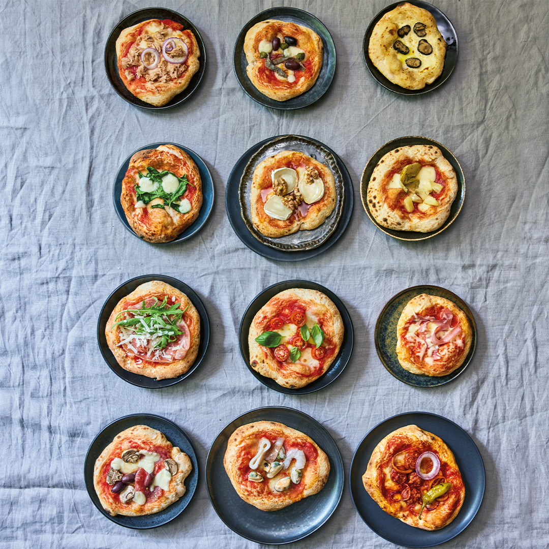 Rezeptbild "Italienische Minipizzen mit Sternzeichenbelag" aus dem Buch "Kochen mit den Sternen" von Antonia Langsdorf und Udo Thies